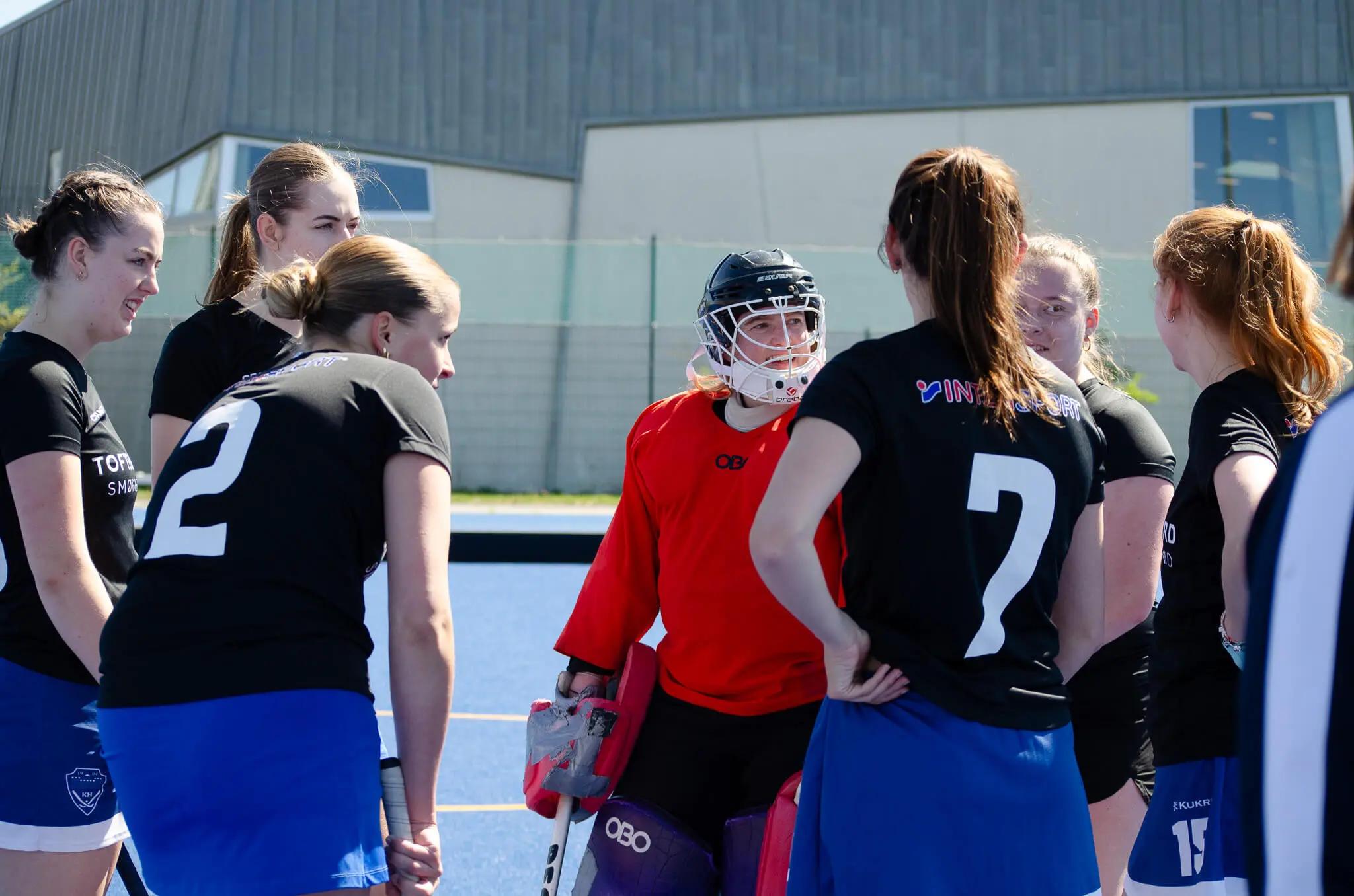 Ladies Team on a break talking tactics