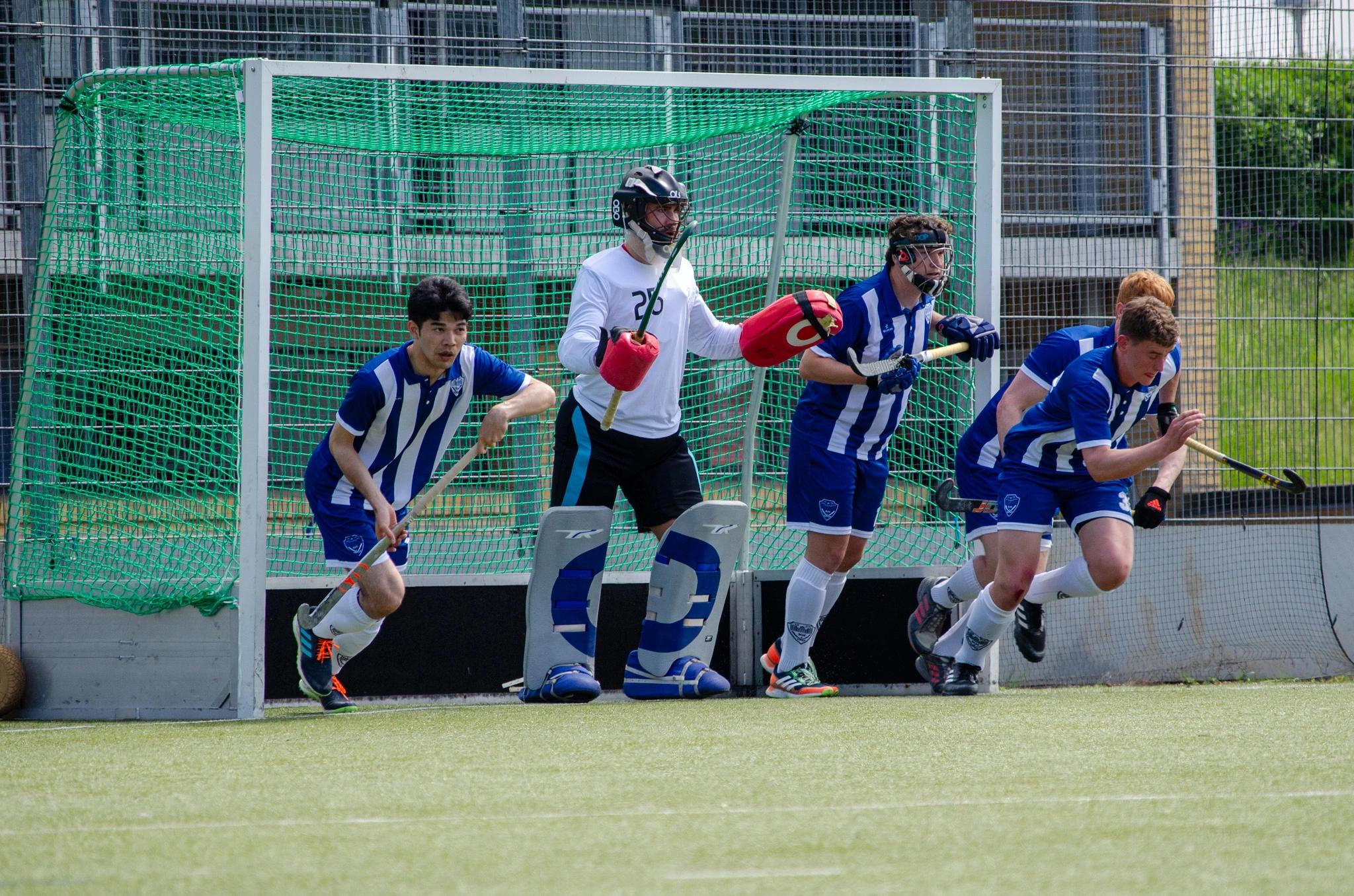 Men's team defending a penalty corner